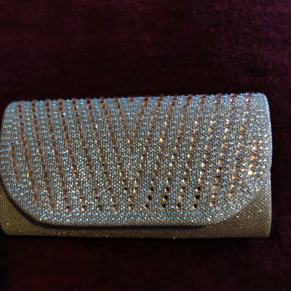 Rose gold clutch bag